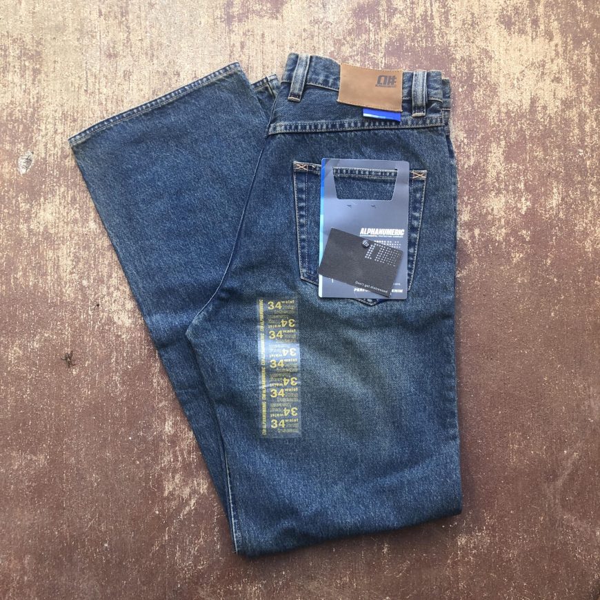 Alphanumeric Performance Denim Distressed Jeans