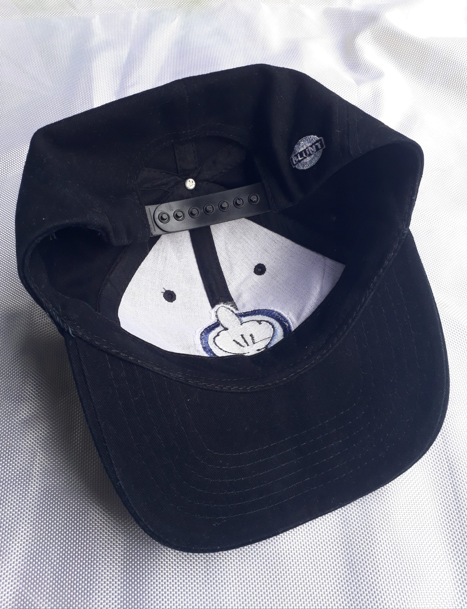 Vintage 90s Mickey Middle Finger Hat 90s Blunt Skateboard Snapback Hat.. Vintage 1990s Mickey Mouse middle finger embroidered cotton snapback hat. Hat is a black with green stitching and an embroidered mickey mouse middle finger logo on the front, and a blunt logo on the back. Hat is adjustable in size and great for her or him with a Normcore, club kid vibe. Label: Blunt made in USA #jbcollectivearchive #bluntskateboards #bluntclothing #90sskateboarding #90sstreetwear