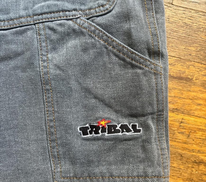 1995 Tribal Gear BlockBuster logo jorts